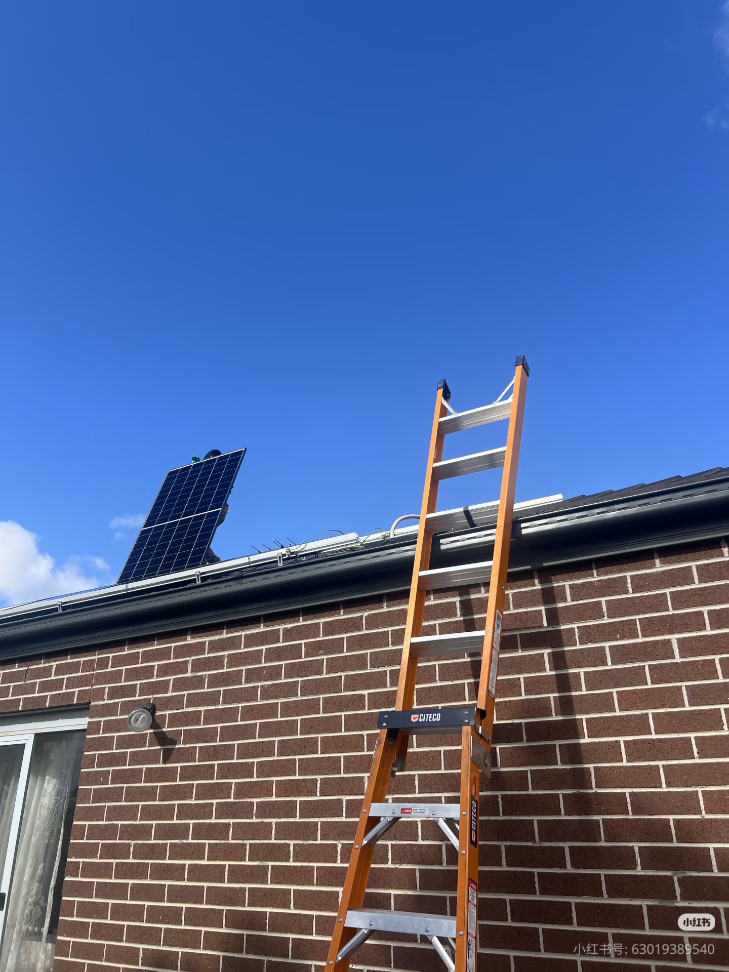 Solar panel installation in progress at a home